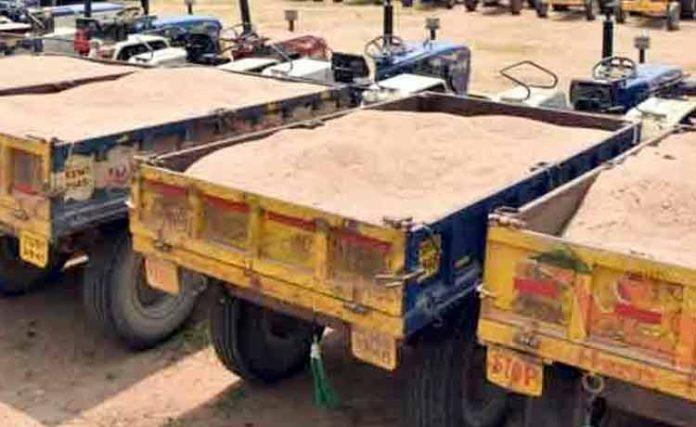 10 Tractors Seized for Illegal Sand transport in Karimnagar