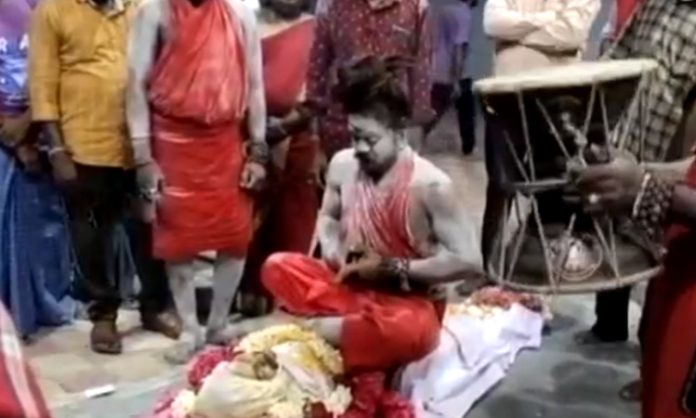 Aghori sit on Dead body