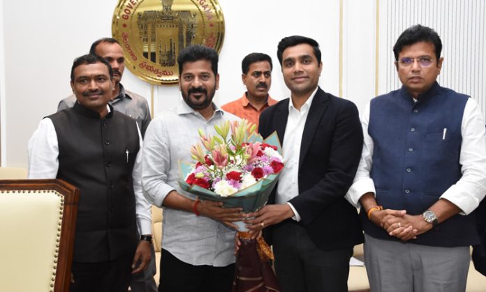 Adani group meet with revanth reddy