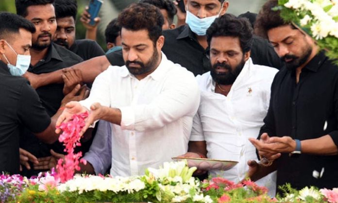 Jr NTR Pays tribute at NTR Ghat on his birth anniversary in Hyderabad