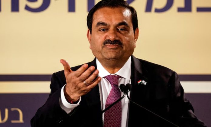 Arrest warrants against Adani