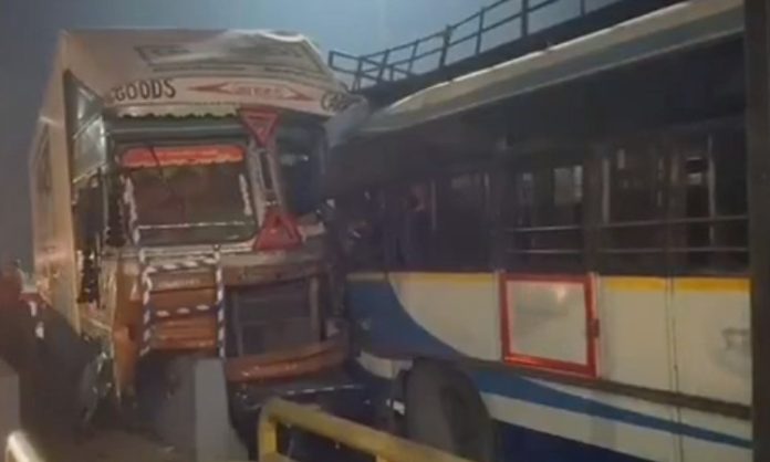 lorry hit an RTC bus in Shad Nagar