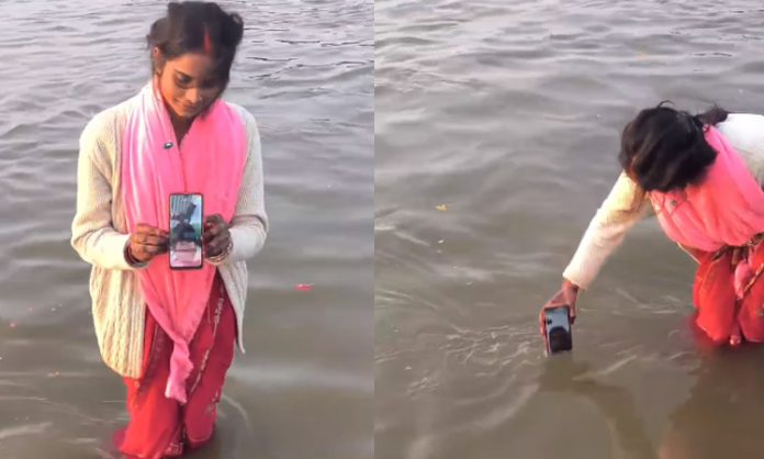 Wife Dunks Phone In Ganga for Her Husband